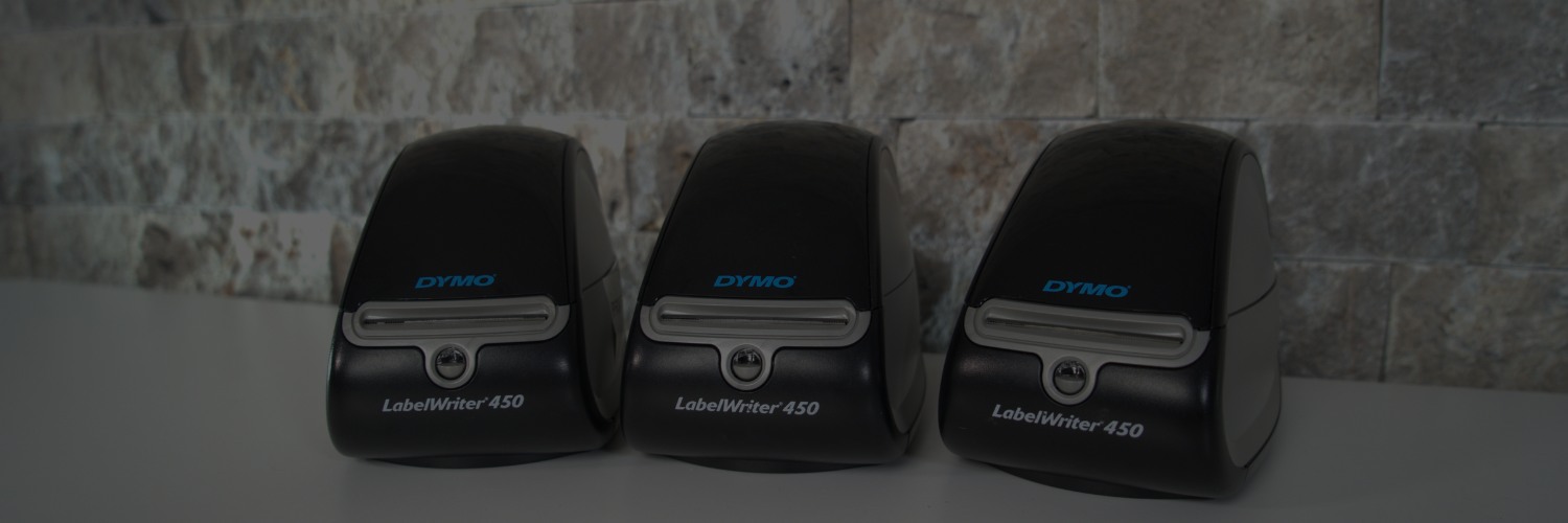 Three DYMO LabelWriter 450 label printers displayed side by side.